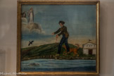 Chapelle Notre-Dame-de-Pitié <br> Victor Véran implorant Notre-Dame de Miséricorde lors de son accident de chasse. 1838. Bois. Joseph Victorin Véran est né le 23 décembre 1809 à Marignane. Il est qualifié de chapelier dans l'acte de son mariage le 16 janvier 1814. La date de l'ex-voto (1838 à l'origine) a été falsifiée pour une raison inconnue. Deux traverses de bois assemblées à vif dans des rainures renforcent le revers.