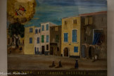Chapelle Notre-Dame-de-Pitié <br> Famille priant Notre-Dame de Pitié suite à la chute de Rosine Jauffret. 1848. Bois. 
Marie Rosine Victorine Jauffret est née le 10 octobre 1844 à Marignane, fille de Joseph Jauffret et Appolonie Aymard, nièce de Rose Aymard, ici représentés. La famille habite au n°5 de la rue des Jardins (actuel n°10 de l’Avenue Jean Jaurès). Le panneau de bois remployé provient probablement d'un meuble démonté. La Pietà peinte en haut à gauche est une copie du tableau du retable de la chapelle.
