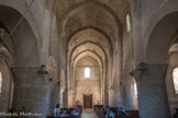 L'église Saint-Martin de Chapaize. <br> Sous la coupole, deux arcs en plein cintre reposent sur des colonnes engagées puis sur quatre piliers ronds qui ont été repris en sous-œuvre au 20e siècle pour stabiliser l’édifice. En 1954, les quatre piles rondes supportant l'énorme clocher menaçaient de s'effondrer. Elles furent entièrement démontées et refaites en béton armé, garni extérieurement des moellons d'origine remis en place.