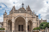 Le cloître et la salle capitulaire sont reconstruits au 13e siècle par le chapitre, comptant trente chanoines à cette époque. En 1265 eut lieu la translation des reliques de saint Flocel et de saint Herné de l’ancienne église Saint-Flocel à Notre-Dame. En 1273, l’église est incendiée par le feu. Elle est restaurée dans le goût gothique et renforcée par des arcs-boutants à la fin du 13e siècle et au début du 14e siècle. A la fin du Moyen-Age, l’église est complétée par un nouveau porche gothique et par des séries de chapelles latérales. Les cardinaux Rolin dotent l’église d’œuvres d’art de style flamboyant et Renaissance de première importance. Un nouvel incendie en 1575 détruisit la flèche du clocher qui est reconstruite par Hugues Sambin.
Notre-Dame fut en grande partie épargnée à la Révolution. Elle fut classée Monument Historique en 1840 et devint église paroissiale. Une campagne de restauration de 1860 à 1863 fut menée par Maurice Ouradou sur les devis de Viollet le Duc datant de 1844. L’église fut nommée basilique mineure en 1958 par le pape Pie XII.