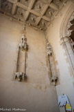 La chapelle Saint Flocel dite de Bouton est la première chapelle au sud. Elle  a un plafond à caissons et un arc sculpté de style Renaissance.