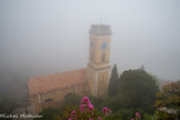 Avec son volume simple, son clocher accolé au chœur en contrebas des ruines du château, l'église d’Eze-Village a été bâtie par l’architecte Antonio Spinelli de 1764 à 1778 en remplacement de l’ancienne église devenue vétuste. Une partie des -fonds nécessaires furent alloués  par le duc Charles Emmanuel III de Savoie. Elle est consacrée le 17 mai 1772.