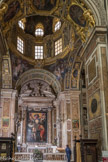 Chiesa del Gesù.<br>Nef latérale gauche. Dans la deuxième chapelle, le Martyre de saint Jean-Baptiste, une fresque de Bernardo Castello, le Baptême du Christ de Domenico Passignano et les statues représentant Élisabeth et Zacharie de Taddeo Carlone.