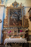 Saint-Sauveur-sur-Tinée <br>Eglise Saint-Michel Archange. Le retable des Âmes du Purgatoire est baigné d'une lumière de ténèbres. La Vierge à l'Enfant, vénérée par sainte Catherine de Sienne et assistée de séraphins, étend sa protection vers les pêcheurs que deux anges extraient des flammes purificatrices sur lesquelles saint Antoine de Padoue verse une eau bienfaisante.