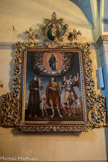 Saint-Sauveur-sur-Tinée <br>Eglise Saint-Michel Archange. Retable de Saint- Pancrace, 1744. Saint Pancrace en position centrale, est encadré par saint Antoine de Padoue et saint Michel surmontés par une Vierge immaculée entourée d'une nuée peuplée de séraphins et d’anges musiciens. Comme souvent rien ne permet d'expliquer l'association des trois saints sur cette toile : un théologien et prédicateur franciscain, un jeune chrétien martyrisé à 14 ans et l'archange vainqueur du démon, son unique représentation d'ailleurs dans une église à laquelle il donne pourtant son nom moderne.