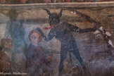 Chapelle Saint Sébastien de Roure. <br> Un diable ôte l'auréole de l'abbé Blanqui sous l'œil de l'Enfer que l'on devine en haut à droite de la fresque.