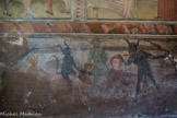 Chapelle Saint Sébastien de Roure. <br> Une des particularités de la chapelle est la fresque dite des « Vices ». Elle a été commandée par les villageois dans un but moralisateur pour rappeler le châtiment réservé aux personnes ayant fauté par la chair. Cette fresque a probablement été voulue par la communauté villageoise à la suite du péché de chair commis 83 ans plus tôt entre l’abbé Pierre Blanqui et Delphine, femme de Jean Bovis.
Un diable noir chevauche la rousse Delphine, pendant qu'un autre ôte l'auréole de l'abbé Blanqui sous l'œil de l'Enfer que l'on devine en haut à droite de la fresque.