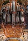 <center>Eglise Saint Théodore</center>Console (piédouche) en bois sculpté, gravée d'instruments de musique. Au dessus petit buffet du positif. Le buffet est d’origine mais pas les tuyaux.