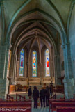 <center></center><center>L'église paroissiale Saint-Laurent </center> L’église sera remaniée au XVème siècle sous le priorat de Aynard de Luyrieux. C’est à cette époque qu’elle sera surélevée avec un voûtement en ogive, type de l’art gothique. Les derniers changements interviendront au XIXème siècle. L’entrée romane sera détruite au profit de la façade actuelle et de la construction de la tribune, le chœur sera surélevé et les vitraux changés, le Jubé démonté et replacé dans le chœur.Sur le mur de droite du chœur, une ouverture permettait à la famille de Savoie d’assister à la messe. Jusqu’au milieu du XIXème siècle, l’église était séparée en deux par un Jubé.