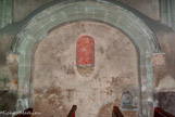 <center></center><center>L'église paroissiale Saint-Laurent </center>A gauche en entrant, on remarque un bénitier rectangulaire du XIIIe siècle ( en bas, à droite). Au centre de l’arc ogival trônait une très belle statue représentant une Vierge enseignante, statue en pierre polychrome du XVème siècle. (Statue non visible de nos jours.)