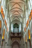 <center>Basilique St Nicolas. </center>  En 1901, le célèbre facteur d'orgues nantais Louis Debierre installait un orgue de tribune de 42 jeux. Ce bel instrument sera détruit lors du bombardement.
En 1963, M. Beuchet-Debierre, petit-fils du fondateur de la Maison, commença une reconstruction partielle avec 27 jeux. Inachevé, ce travail sera complété, en 1985, par la Maison Renaud qui, avec du matériel en partie construit par Beuchet, portera l'orgue à 54 jeux répartis sur trois claviers et pédalier.
Jamais complètement parachevé, cet instrument nécessitait un grand relevage, une recomposition et une harmonisation digne de ce nom. Les travaux, confiés au facteur Bernard Hurvy, ont commencé à l'automne 2002. Le grand orgue, entièrement restauré, a été inauguré le 21 mars 2004.