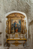 <center>L'église Saint-Trophime de Saumane.</center> Tableau de la Donation du rosaire à saint Dominique et sainte Catherine de Sienne
