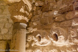 <center>L'édifice quadrilobé dit « le baptistère» </center> Ces deux «tuyaux» ont pu alimenter le temple païen en eau. Il est possible que les chrétiens s'en soient servis. Leur forme en goutte d'eau empêchait l'eau de ruisseler contre le mur. Il pouvait peut-être y avoir une vasque pour recueillir l'eau et un système de canalisations qui arrivait jusqu'à la cuve baptismale...l'eau pouvait provenir soit d'une source, soit d'une citerne.