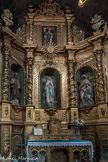 L’église Notre-Dame-des-Anges. <br> Retable de la chapelle de Notre-Dame de Lourdes. Dès que l'église fut construite, cette chapelle fut dédiée à N.-D. de la Conception. Au siècle dernier elle abritait la statue de « La Mare de Deu dels pobres », N.-D. des Pauvres, aujourd'hui dans une maison particulière, ainsi que celles de Sainte Anne et Saint Joachim, transportées à l’ermitage de Consolation. L’ancien retable a disparu ; les boiseries actuelles furent offertes en 1902 par Mme Paul Oliver de même que les statues.