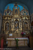 L’église Notre-Dame-des-Anges. <br> Retable de Saint-Jean, daté de 1697.  En haut, au centre, la statue de saint Jacques le Majeur, au centre saint Jean-Baptiste, avec à ses côtés, dans des médaillons, ses parents sainte Elisabeth et saint Zacharie. A gauche, saint Pierre (dans un médaillon) et saint Joseph, et à droite, saint André (dans un médaillon), et  saint Isidore. Sous les statues figure la tête de saint Jean Baptiste décapité, posée sur un plateau. Hérodiade  lui crève un oeil. En bas, de gauche à droite, un saint prêtre, les attributs de St Joseph (le rabot et le compas), une religieuse, la visitation de la Vierge à Elisabeth, un saint, les attributs de st Jean-Baptiste, deux cimeterres, un saint. Dans la partie supérieure de petites statues en terre cuite et assez naïves auraient été fabriquées par les moines du couvent.