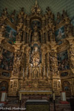 L’église Notre-Dame-des-Anges. <br> Retable du maitre-autel. Outre les grands sujets, une multitude de statuettes de saints, de figurines d'anges complète l'idée de l'artiste et donne la vie au tableau. Le nombre total des figures, petites et grandes est de quatre-vingt-dix-sept.
Sunyer s'engagea à faire tout ce travail en quatre ans à partir du 6 octobre 1698. Le 75 avril 1699 on plaça le piédestal du maître-autel. Le 18 avril 1700 on pro céda à l'installation et à la bénédiction du premier étage. Le 17 décembre 1701 on éleva la seconde rangée des apôtres.
