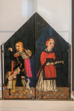 Musée Hyacinthe Rigaud. <br> Anonyme (école catalane).
Saint Roch et Saint Étienne. 
Diptyque entre 1350 et 1400.
Peinture sur bois. Au revers du diptyque, sont représentés les outils de la confrérie des paysans: le soc de la charrue, la houe et la faucille. Au centre, l'écu catalan.