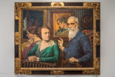 Musée Hyacinthe Rigaud. <br> George-Daniel de Monfreid
(New-York, USA, 1856 - Corneilla-de-Conflent, 1929)
Hommage à Gauguin ou Groupe de famille (en souvenir de Paul Gauguin)
1925
Huile sur papier
Isolé aux îles Marquises, Gauguin lui adresse en 1896 son autoportrait dédicacé a «mon ami Daniel» qui semble être le sujet de cette étonnante composition.
De part et d’autre, la Barque et le Masque de Tehura, autres œuvres de Gauguin. Au premier plan, trois personnages que rien ne relie: le peintre, sa belle-sœur et sa femme. Regards, mains, postures n’établissent aucun lien entre des personnages absents et isolés faisant des œuvres de Gauguin le véritable cœur du tableau.