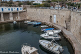 Un petit port avait été construit à proximité pour amener le minerai par péniches et barges. Le minerai (galène) arrivait d'Espagne, d'Italie, mais aussi de l'Argentière, par bateaux au port. Ensuite des embarcations plus légères le transportait dans ce petit port où il était débarqué et chargé dans des wagonnets qui, en empruntant un tunnel dont on peut voir l'entrée  et qui passait sous la route, l'emmenait dans l'usine. Dans ce port, des navires de 100 tonneaux pouvaient facilement entrer. Quelques bateaux caboteurs y abordaient directement d’Espagne. Il y eut, ainsi qu’aux Goudes, un poste de douane.